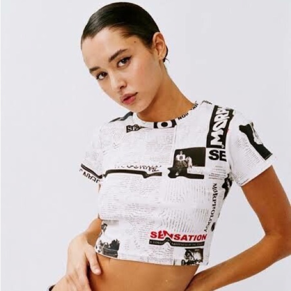 With Jean newspaper top